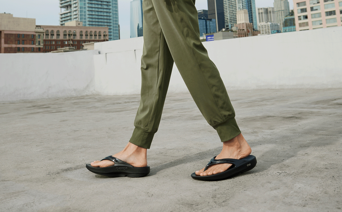 Women's OOlala Sandal - Black model walking outside | lifestyle