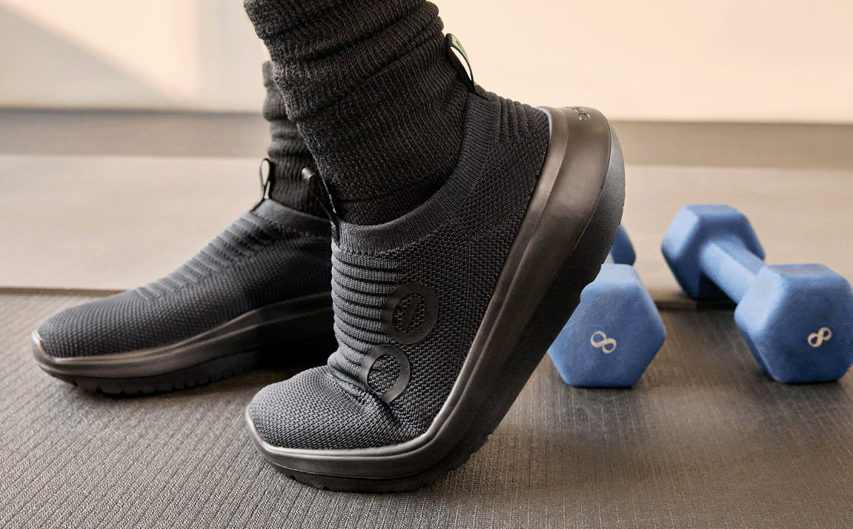 Women's OOmy Zen - Black shoes on model standing on workout mat | lifestyle