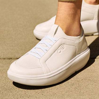 model wearing white club plus shoe