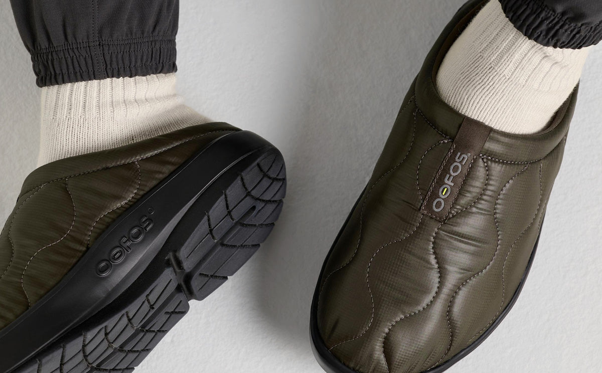 Alpine Moss close up top view of shoes on model sitting down in studio | lifestyle