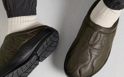 Alpine Moss close up top view of shoes on model sitting down in studio | lifestyle