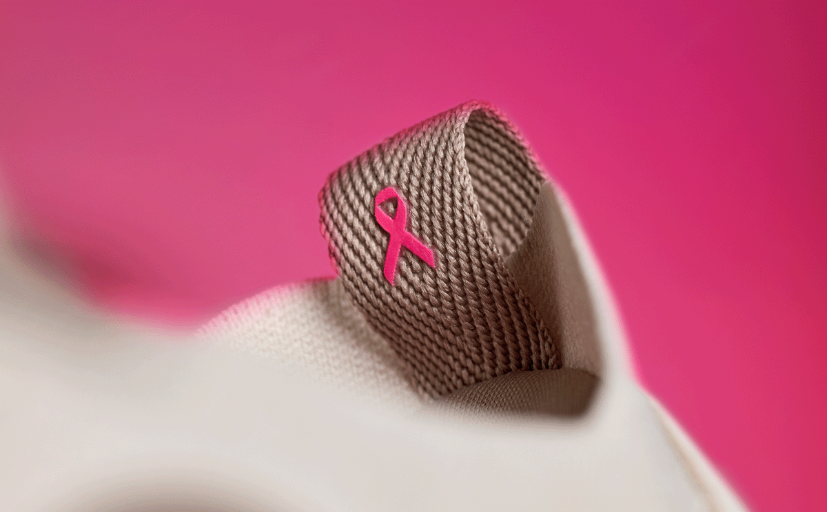 Men's Limited Edition 2025 OOmy Stride - Project Pink close up of shoe | lifestyle