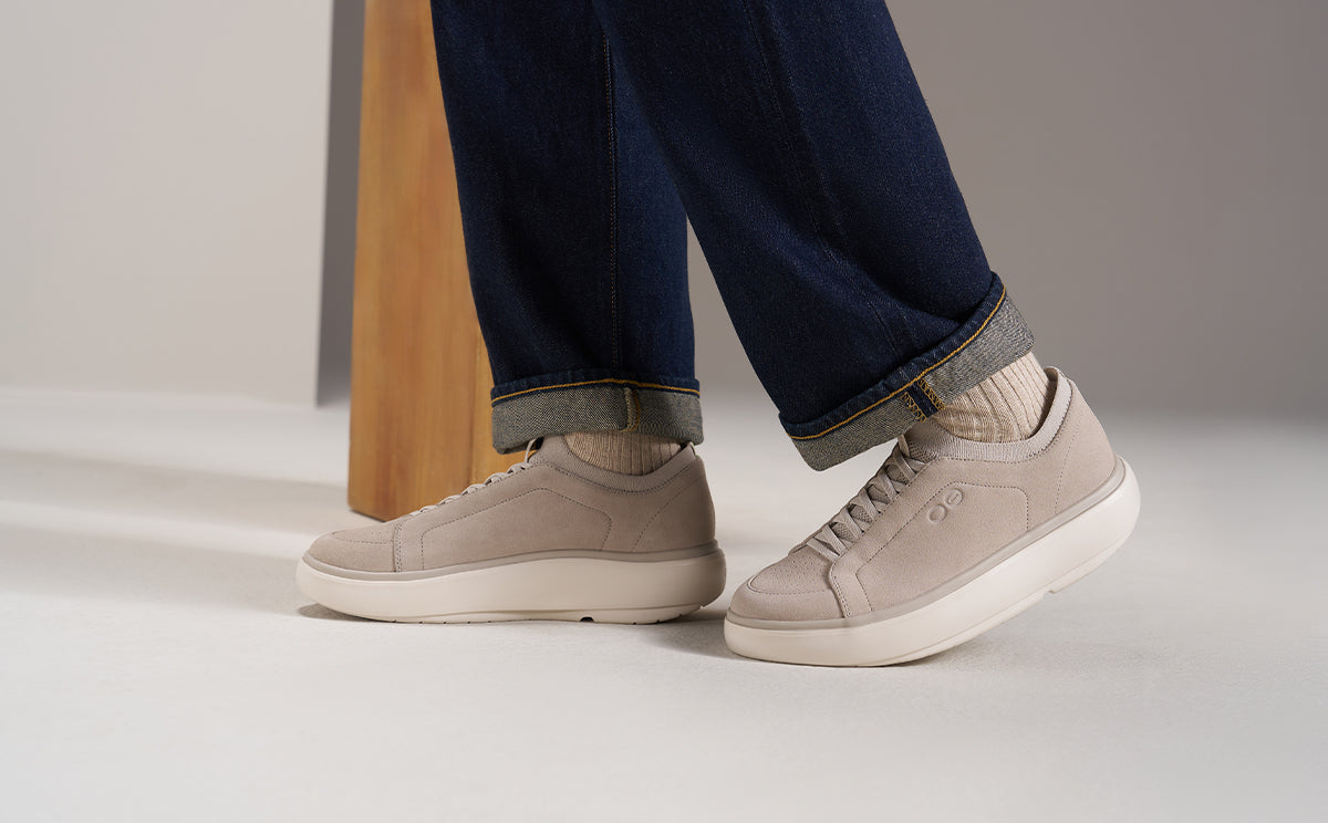 model standing in studio wearing suede club plus moonbeam | lifestyle