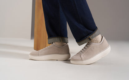 model standing in studio wearing suede club plus moonbeam | lifestyle